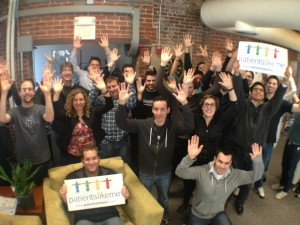 rare-disease-day-2013-plm-employees-raising-hands